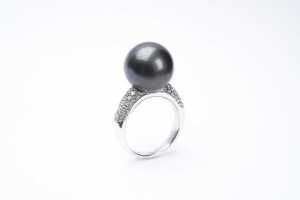 A Tahitian pearl and diamond ring in 18 carat white gold