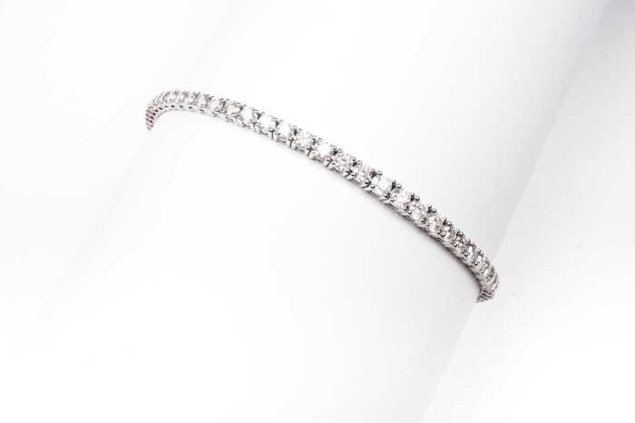 A diamond bolo bracelet in 14 carat white gold