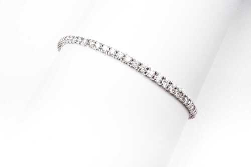 A diamond bolo bracelet in 14 carat white gold