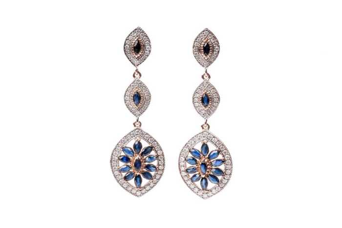A pair of sapphire and diamond earrings in 14 carat rose gold