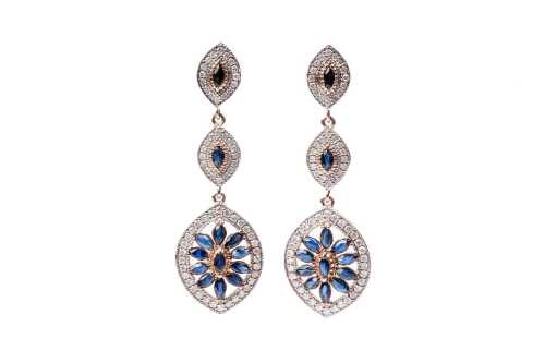 A pair of sapphire and diamond earrings in 14 carat rose gold