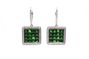 A pair of tsavorite garnet and diamond earrings in 18ct white gold