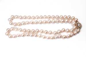 An Opera length strand of pearls to a opal and pearl clasp in 9 carat yellow gold - 3