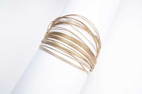 A vintage Tiffany & Co. multi strand wire bracelet in 18 carat yellow gold