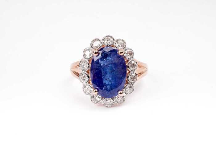 A tanzanite and diamond ring in 14 carat rose gold