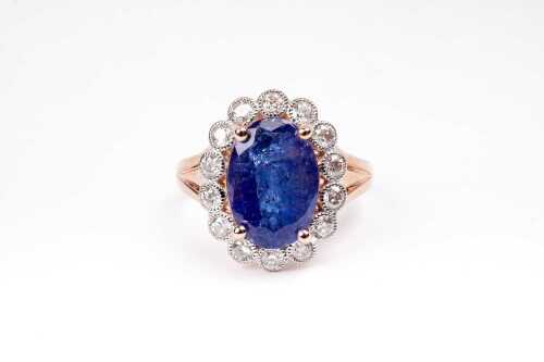 A tanzanite and diamond ring in 14 carat rose gold