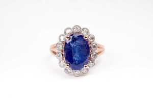 A tanzanite and diamond ring in 14 carat rose gold