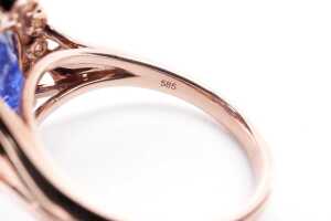A tanzanite and diamond ring in 14 carat rose gold - 5