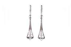 A pair of black and white diamond earrings