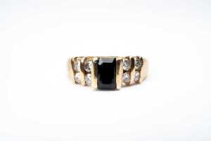 A sapphire and diamond ring in 18 carat yellow gold