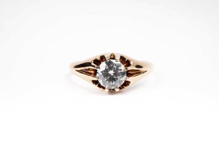 A diamond solitaire ring in 18 carat yellow gold