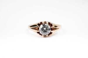 A diamond solitaire ring in 18 carat yellow gold
