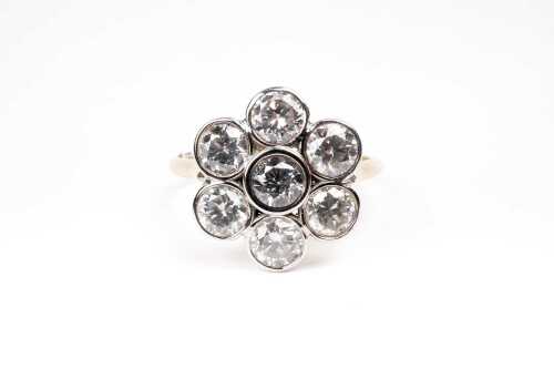 A diamond ring in 18 carat yellow gold