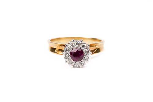 A vintage ruby and diamond ring in 18 carat yellow gold an platinum