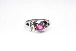 A ruby and diamond ring in 18ct white gold
