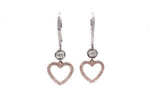 A pair of pink and white diamond earrings in 14 carat white and rose gold