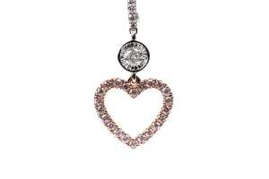 A pair of pink and white diamond earrings in 14 carat white and rose gold - 2