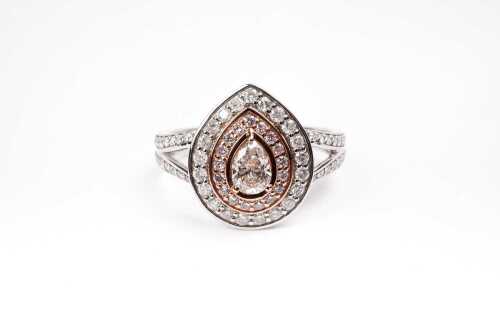 A pink and white diamond ring in 14 carat white and rose gold