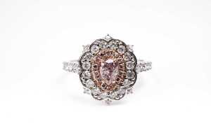 A pink and white diamond ring in 14ct white and rose gold