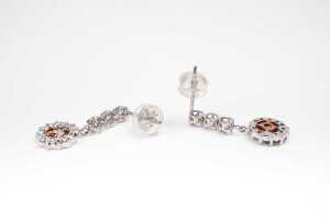 A pair of pink and white diamond earrings in 18 carat white and rose gold - 3