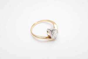 A bezel set pear cut diamond solitaire ring in 18ct yellow and white gold - 2
