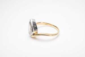 A bezel set pear cut diamond solitaire ring in 18ct yellow and white gold - 3