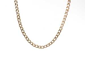 A curb chain in 9 carat yellow gold