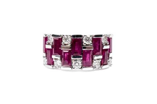 A ruby and diamond ring in 14 carat white gold