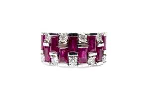 A ruby and diamond ring in 14 carat white gold