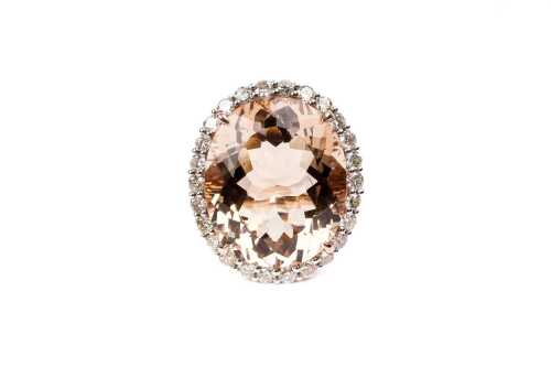 A morganite and diamond ring in 14 carat rose gold