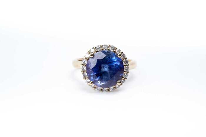 A tanzanite and diamond ring in 18 carat yellow gold
