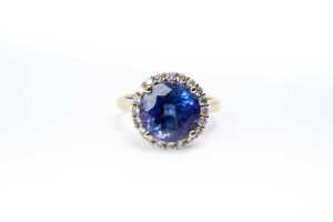A tanzanite and diamond ring in 18 carat yellow gold