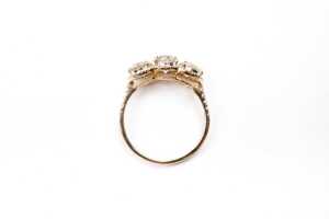 A trilogy halo diamond ring in 14 carat yellow gold - 4