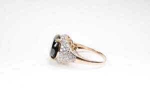 A black and white diamond ring in 14 carat yellow gold - 4