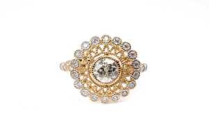 A diamond ring in 14 carat yellow gold