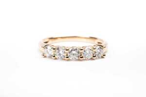 A diamond ring in 14 carat yellow gold