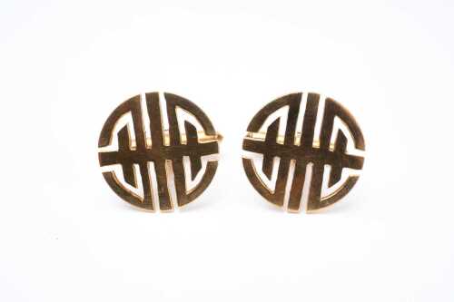 A pair of vintage cufflinks in 14 carat yellow gold