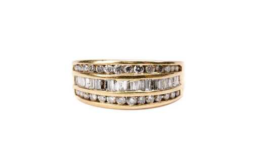 A diamond ring in 18 carat yellow gold