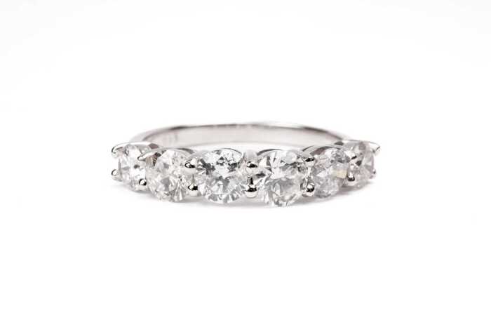 A diamond eternity ring in 14 carat white gold