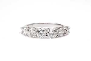 A diamond eternity ring in 14 carat white gold