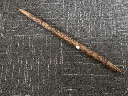Indigenous digging stick with pokerwork decoration