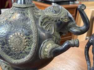 Two decorative elephants, one of which is a vase - 5