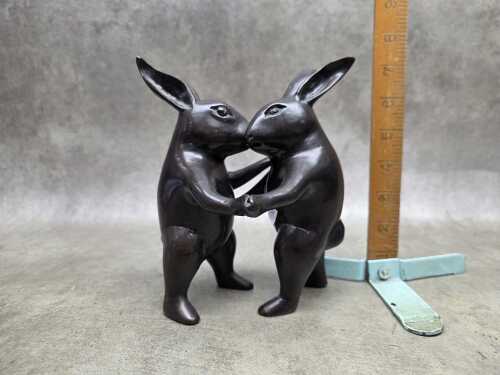 Brass Dancing Rabbits with bronze patina