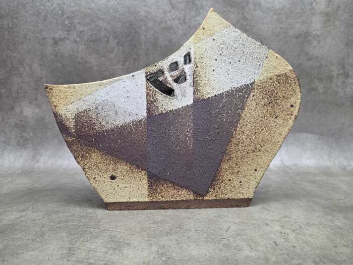 Modernist style ceramic vase with earth tones