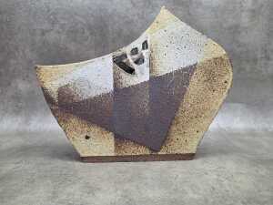 Modernist style ceramic vase with earth tones
