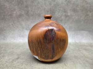 Hand-turned spherical Huon pine vase with natural knot detail - 2