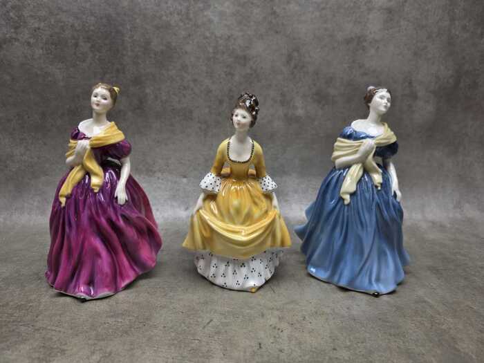 Three Royal Doulton porcelain lady figures