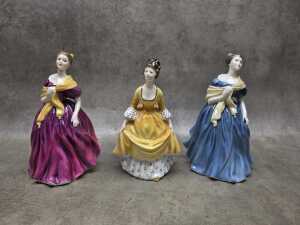 Three Royal Doulton porcelain lady figures