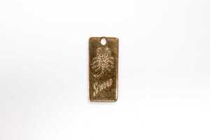 A Scorpio medallion in 9 carat yellow gold