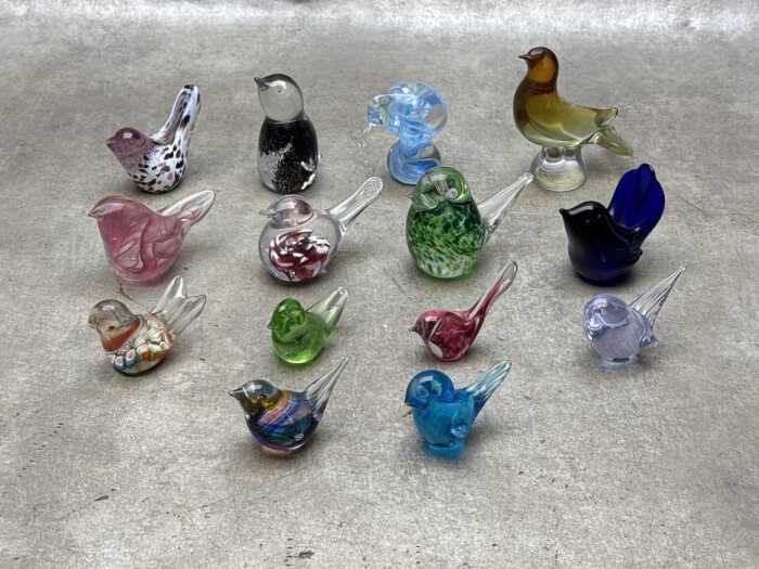 Fourteen glass bird paperweights